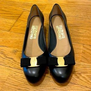 Salvatore Ferragamo Vara pumps, black leather with gold detailing, US size 7.